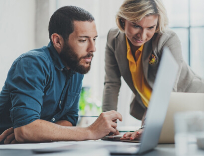 Business Couple with Laptop